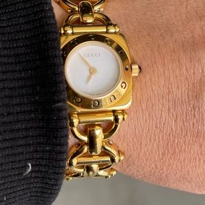 Gucci watch/ bracelet